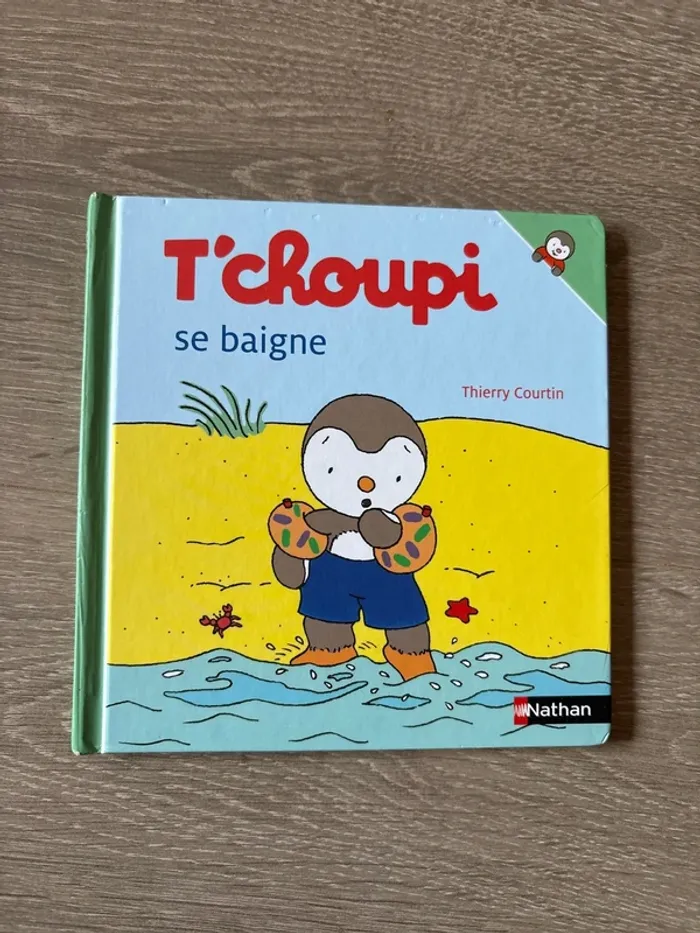 T'choupi se baigne