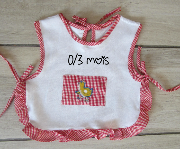 Bavoir/tablier neuf bébé fille