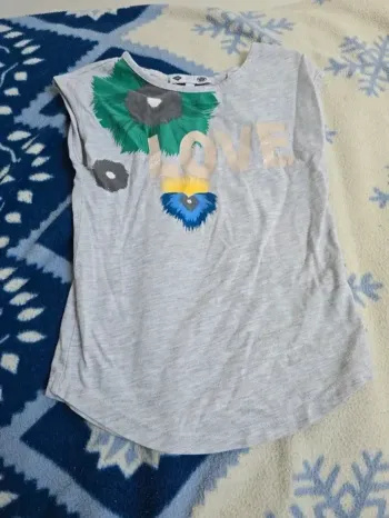  T-shirt en bon état de la marque TEX en taille 5-6 ans