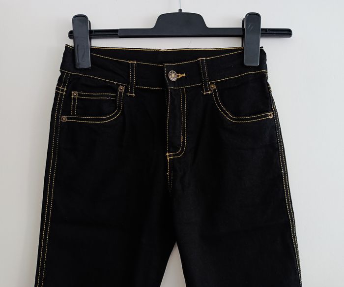 Jean noir. Taille 10 ans. 140 cm. - photo numéro 2