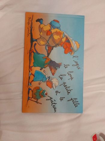 Livre pour enfant, l'ogre le loup la petite fille et le gâteau.