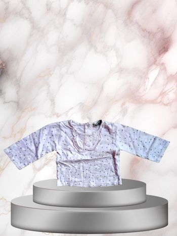 Le t-shirt Doux pour bébé fille taille 12 mois qui donne un look de petite princesse