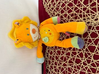 Lion POMMETTE doudou jaune orange