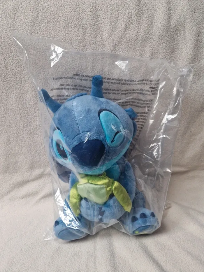 Neuf jolie peluche stitch avec ça grenouille disney