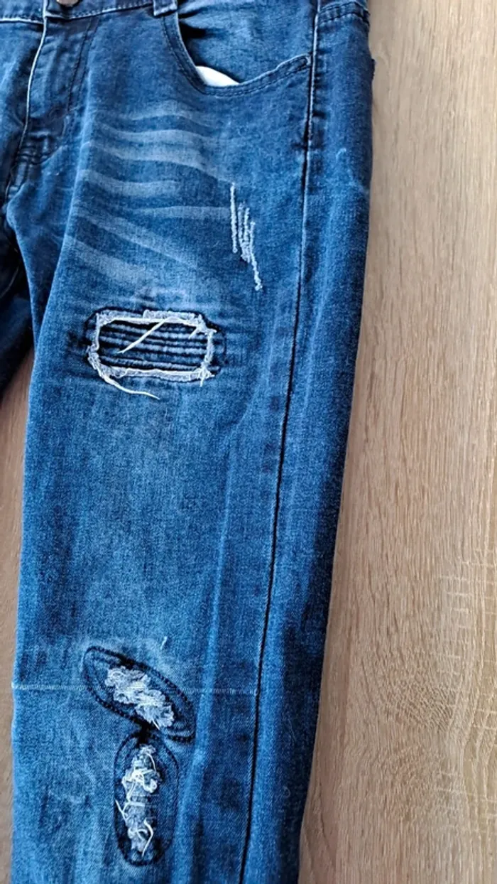 Jeans effet délavé déchiré - photo numéro 2