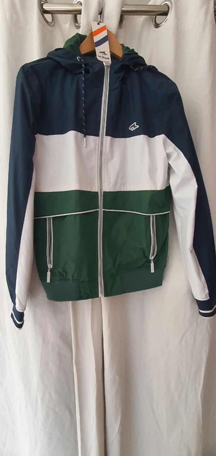 Imperméable capuche
