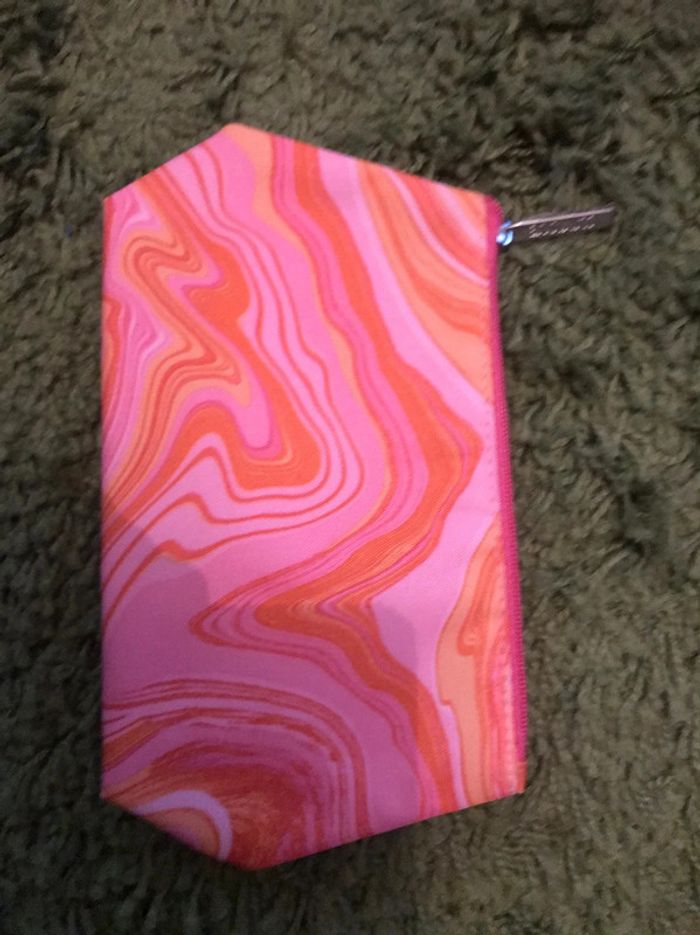 trousse rose et orange clinique