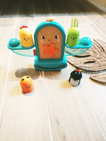 🐥Jeu multi activités - Balance Mon oiseau à bascule en bois et plastique marque Fisher Price JB104