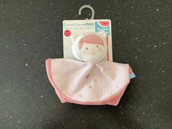 Doudou plat rond rose poupée