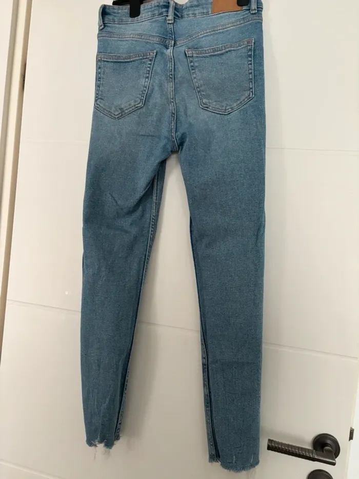 Jeans skinny taille haute avec découpage - photo numéro 3