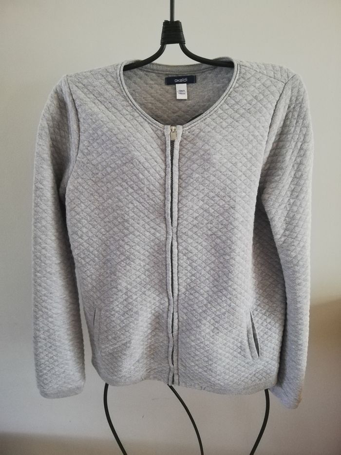 Veste zippé gris légèrement pailletés
