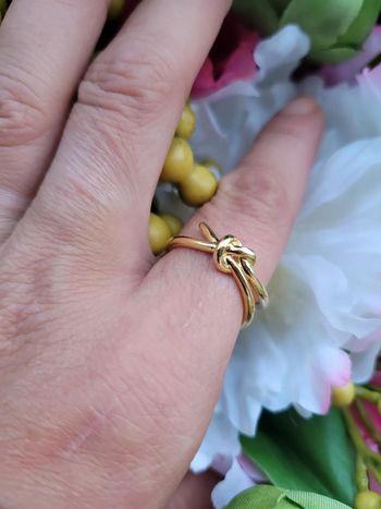 Bague nœud coupé acier gold