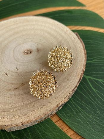 Boucles d’oreilles or scintillantes