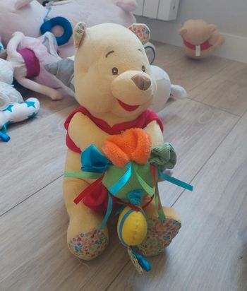 Winnie éveil peluche