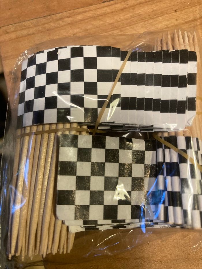 Cure dents drapeau de course