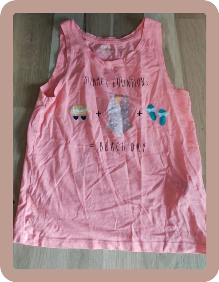 Tee-shirt sans manches Kiabi taille 8 ans en très bon état