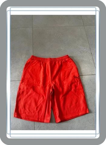 Short orange Puma, made in france, neuf avec étiquette, Unisex, taille L homme