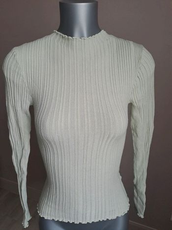 Pull col montant