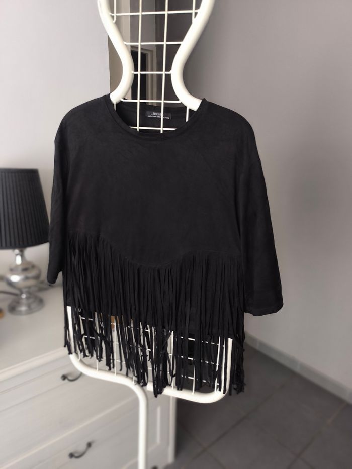 Haut a franges
