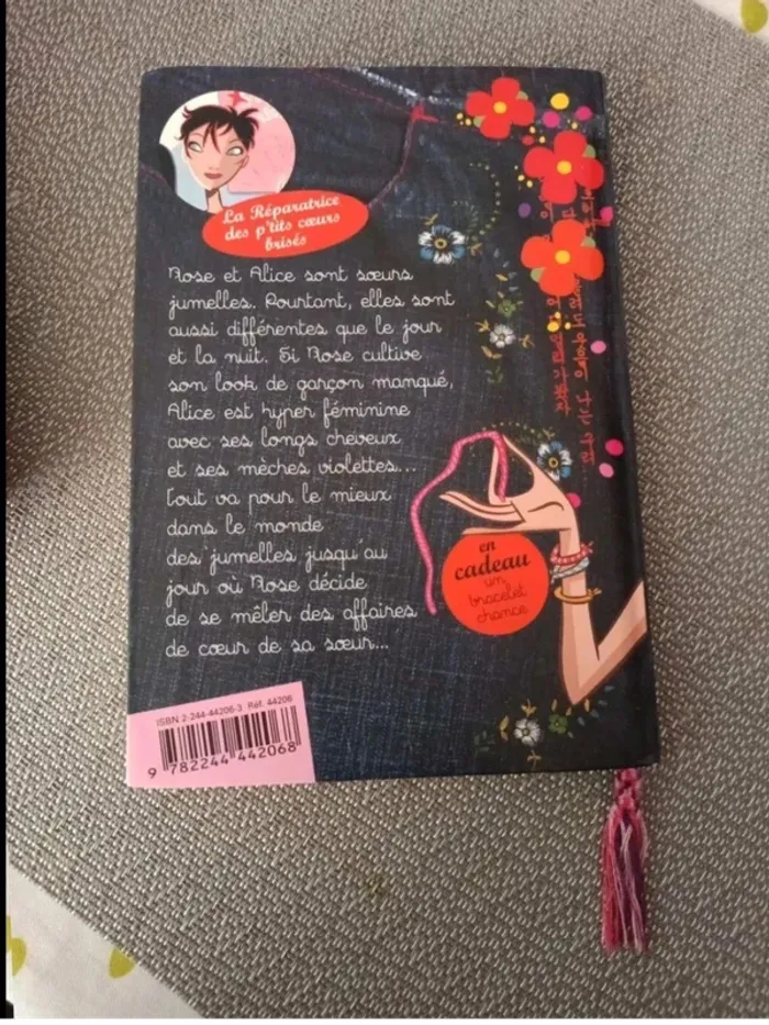 Livre La réparatrice des p'tits coeurs brises bon état - photo numéro 2