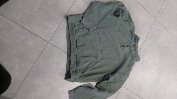 Pull col montant