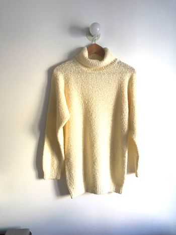 Pull col roulé crème effet bouclettes taille 40/42