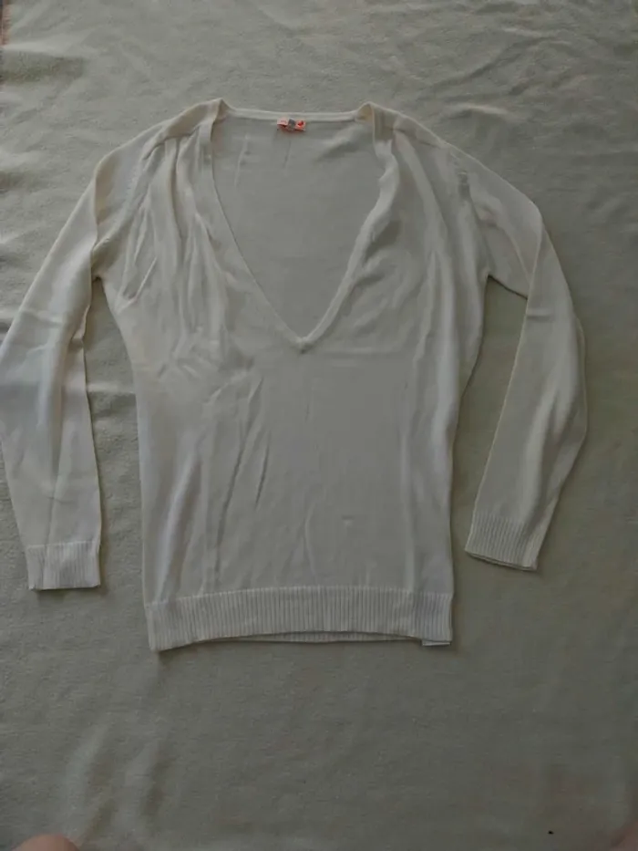 Pull blanc cassé grand col TM