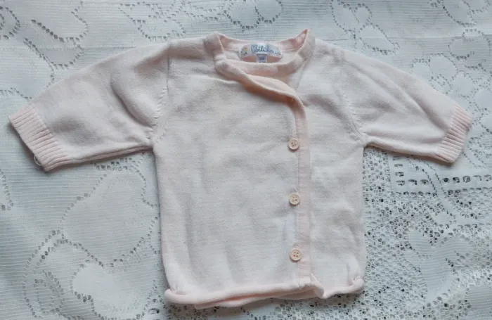 Gilet rose clair Kitchoun, en très bon état, taille naissance