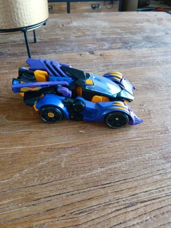 Dinosaure voiture switch and go violet