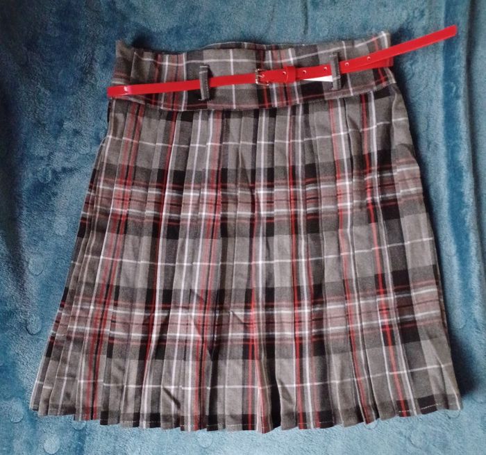 Jupe plissée à carreaux effet