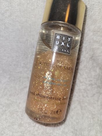 Huile scintillante neuf