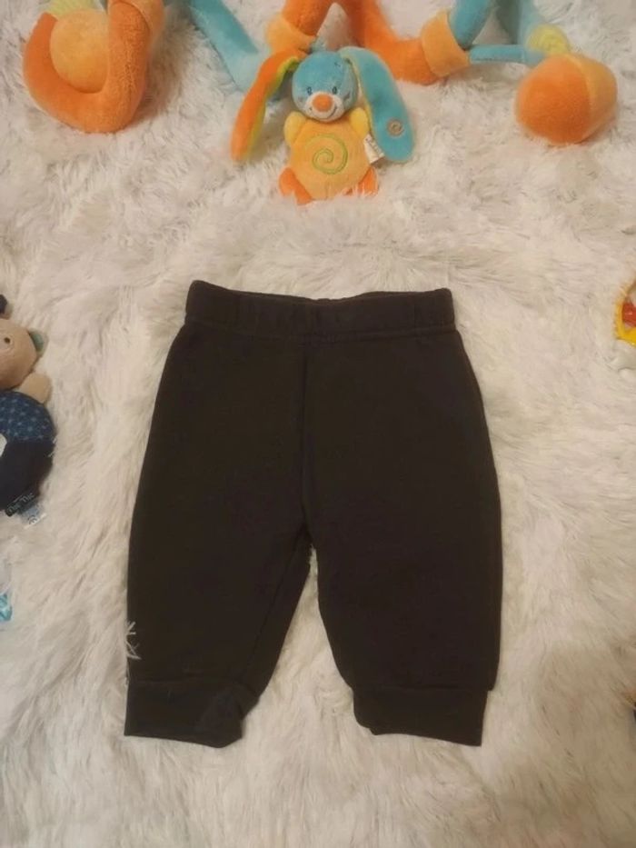 Jogging molletonné T. 6 mois 💮 78% Coton 22% Polyester
