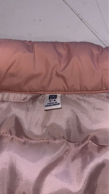 Veste sans manche uniqlo neuf  3/4 ans 