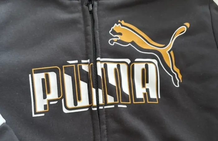 Veste Puma noire – Taille 5/6 ans - 3€ - photo numéro 2