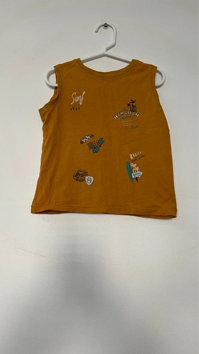 T shirts sans manche in extenso en parfait état taille 4 ans . - photo numéro 5
