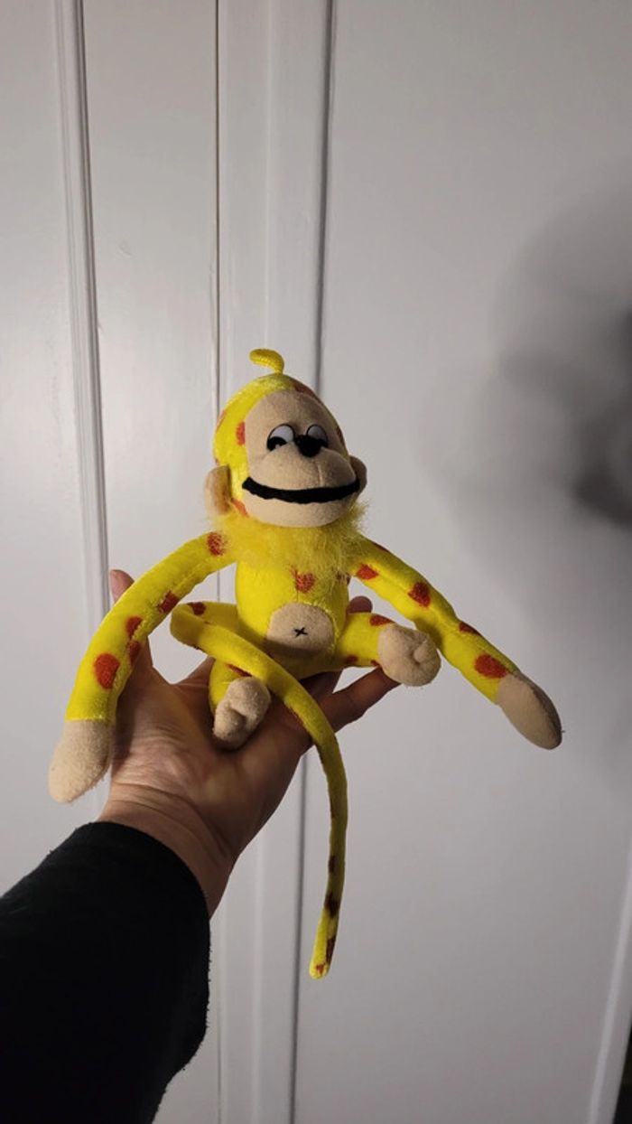 Peluche singe style Marsupilami