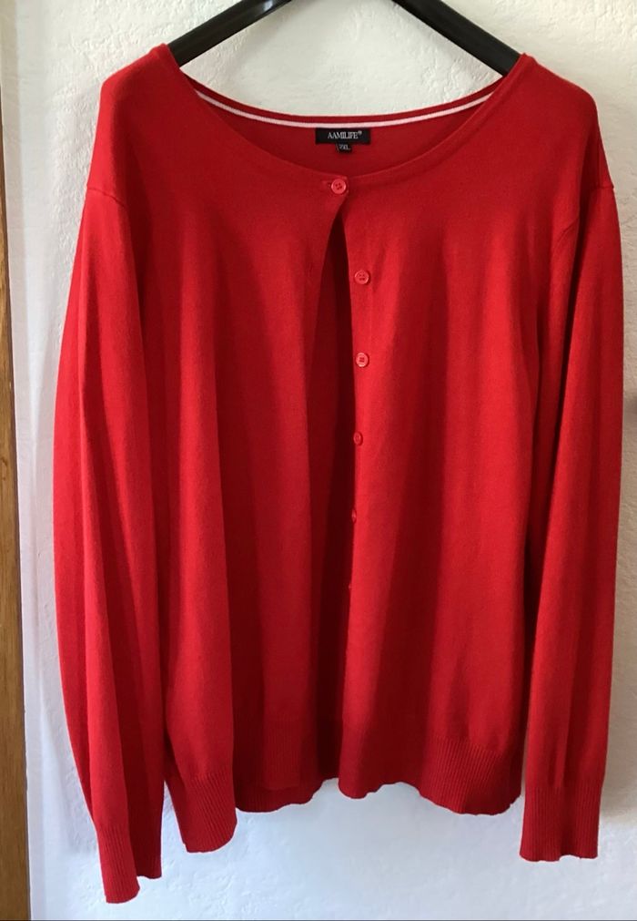 Gilet rouge de très belle qualité 44/46