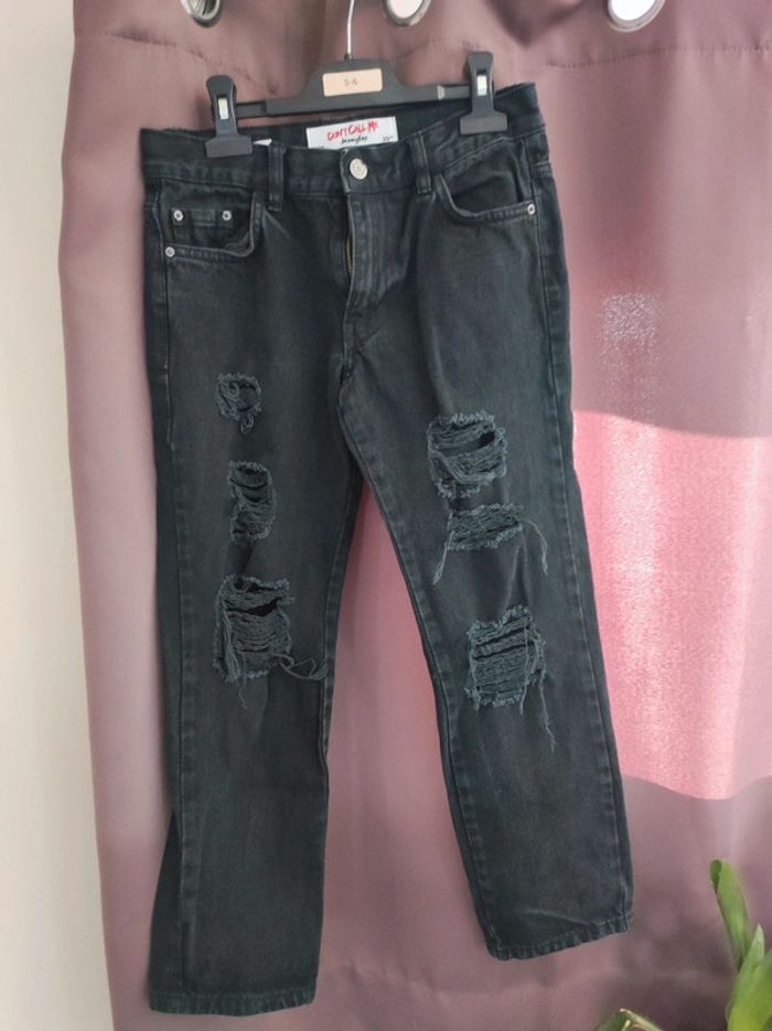 Jean noir déchiré ado