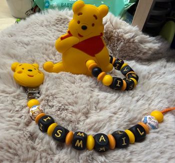 Attache tétine Winnie l’ourson