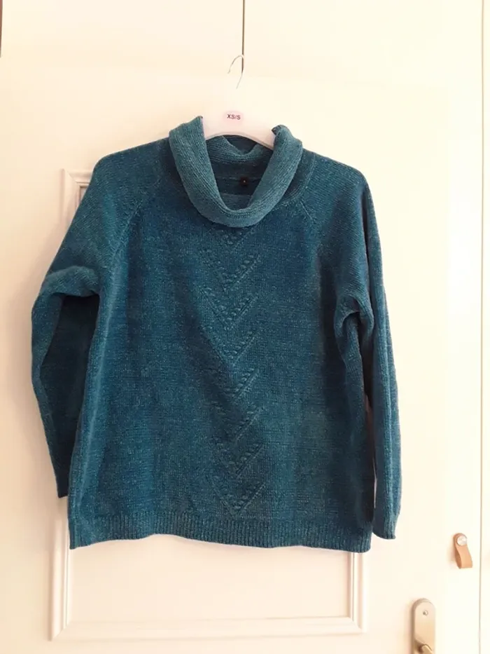 Pull col roulé