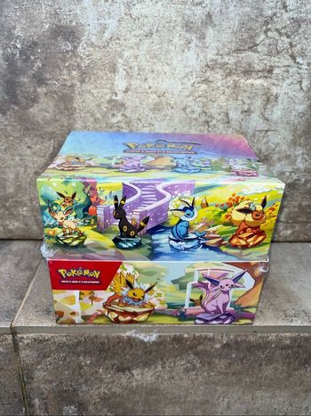 Display Pokémon mini tin 8.5 évolutions prismatiques