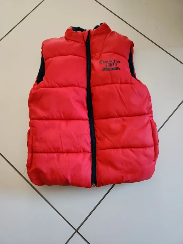 Doudoune sans manches taille 5/6ans