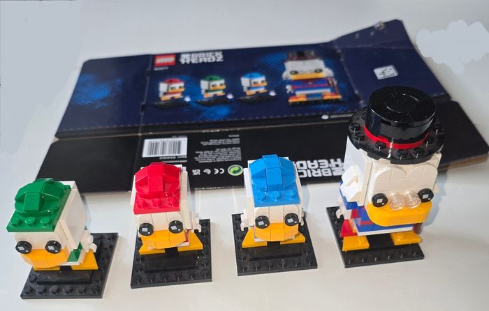 Lego brick headz picsou, rire, fifi et loulou disney 127, 128, 129 et 130 avec boite et notices