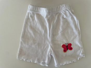 Short bébé blanc papillon