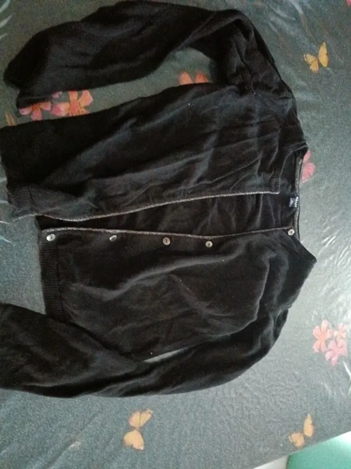 Gilet noir Kiabi paillette 10 ans