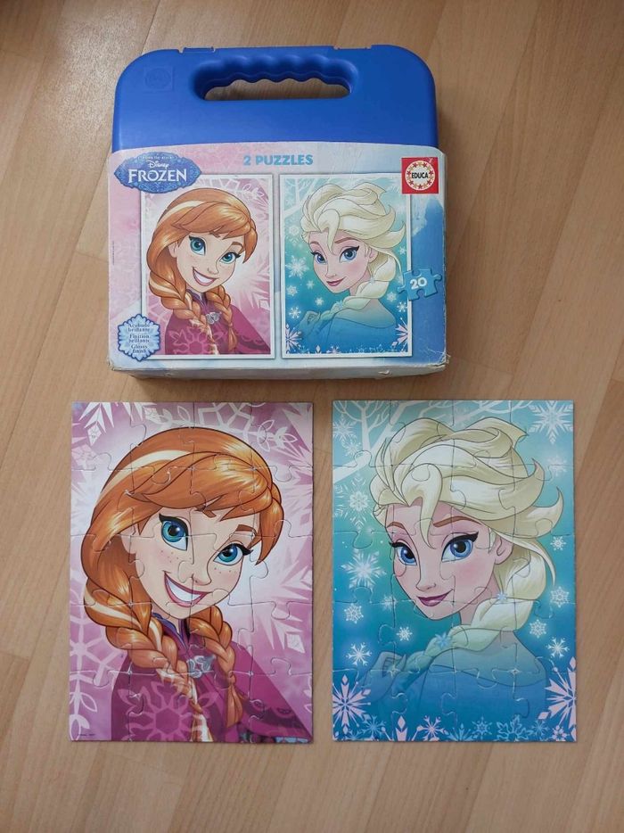2 puzzles reine des neiges  3/4 ans