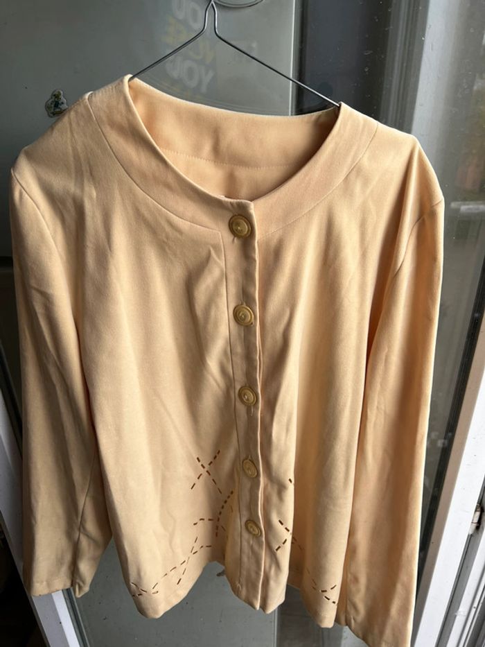 Veste jaune 46 très bon état