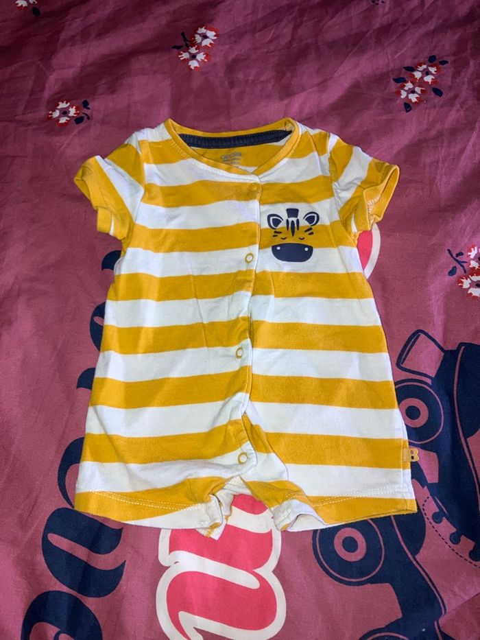 Barboteuse 1 mois Noukie’s blanc jaune