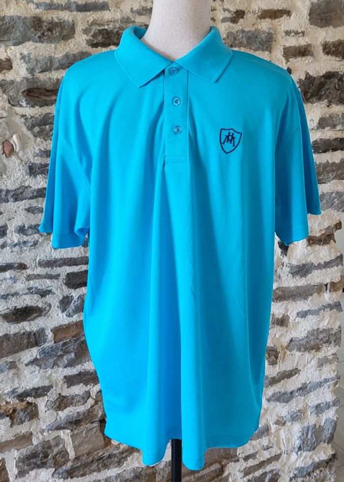Polo manches courtes bleu turquoise L'Homme Moderne Taille M/L