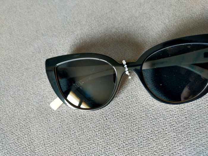 Lunettes de soleil noires et blanches – style œil de chat - photo numéro 11